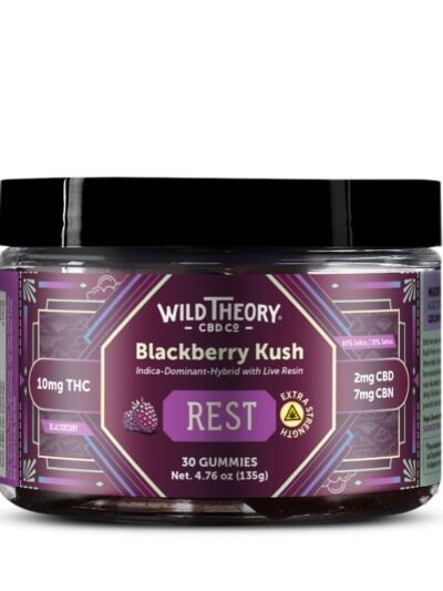 Wild Theory Blackberry Kush REST 10mg THC Gummies 30 Gummies, front label view. The packaging displays a purple patterned design with “Blackberry Kush” and “REST” prominently centered. It highlights 10 mg THC per gummy, along with 2 mg CBD and 7 mg CBN, and includes blackberry flavor imagery. The label indicates 30 gummies and features an extra strength icon.